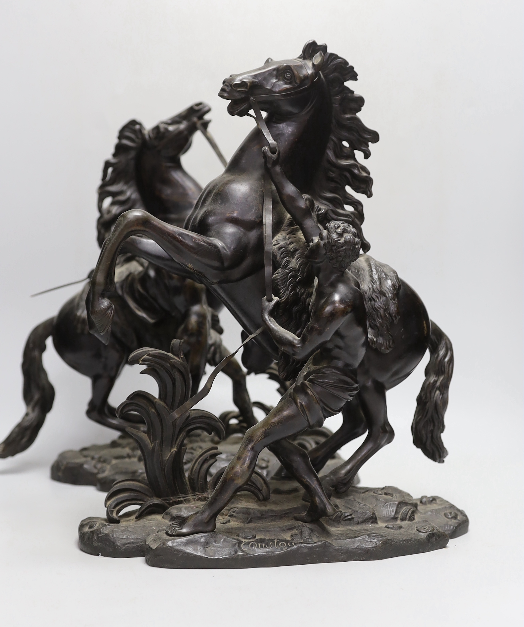 After Coustou, a pair of bronze ‘Marly’ horses, 39cm high, 38cm wide